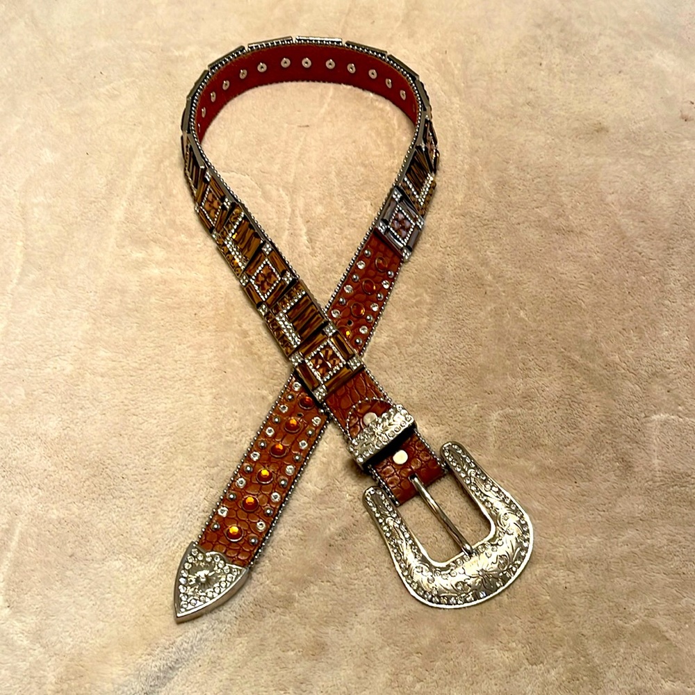 Bling like mad!  Barely worn, gold and bronze tones on quality leather belt